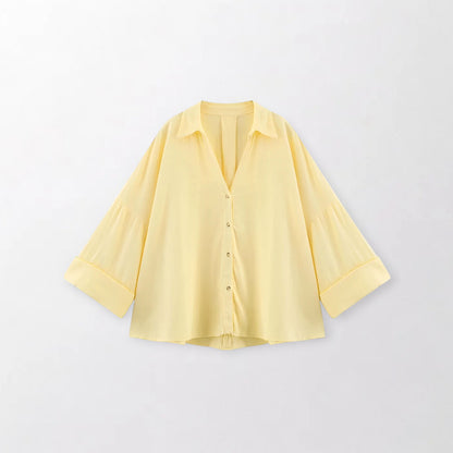 Blusa de mangas anchas